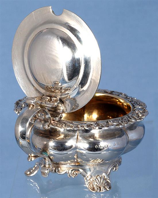 A set of four George III provincial silver table salts with matching mustard, Diameter 3 ¾”/94mm combined weight 21.5oz/609grm